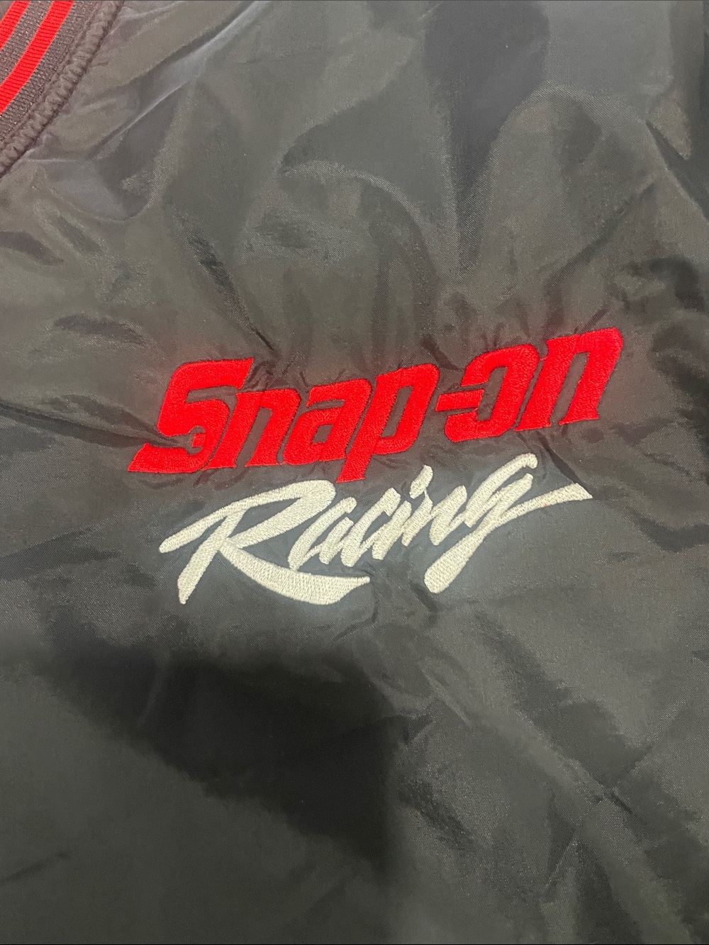 Snap Black Windbreaker with Red Trim Racing Logo